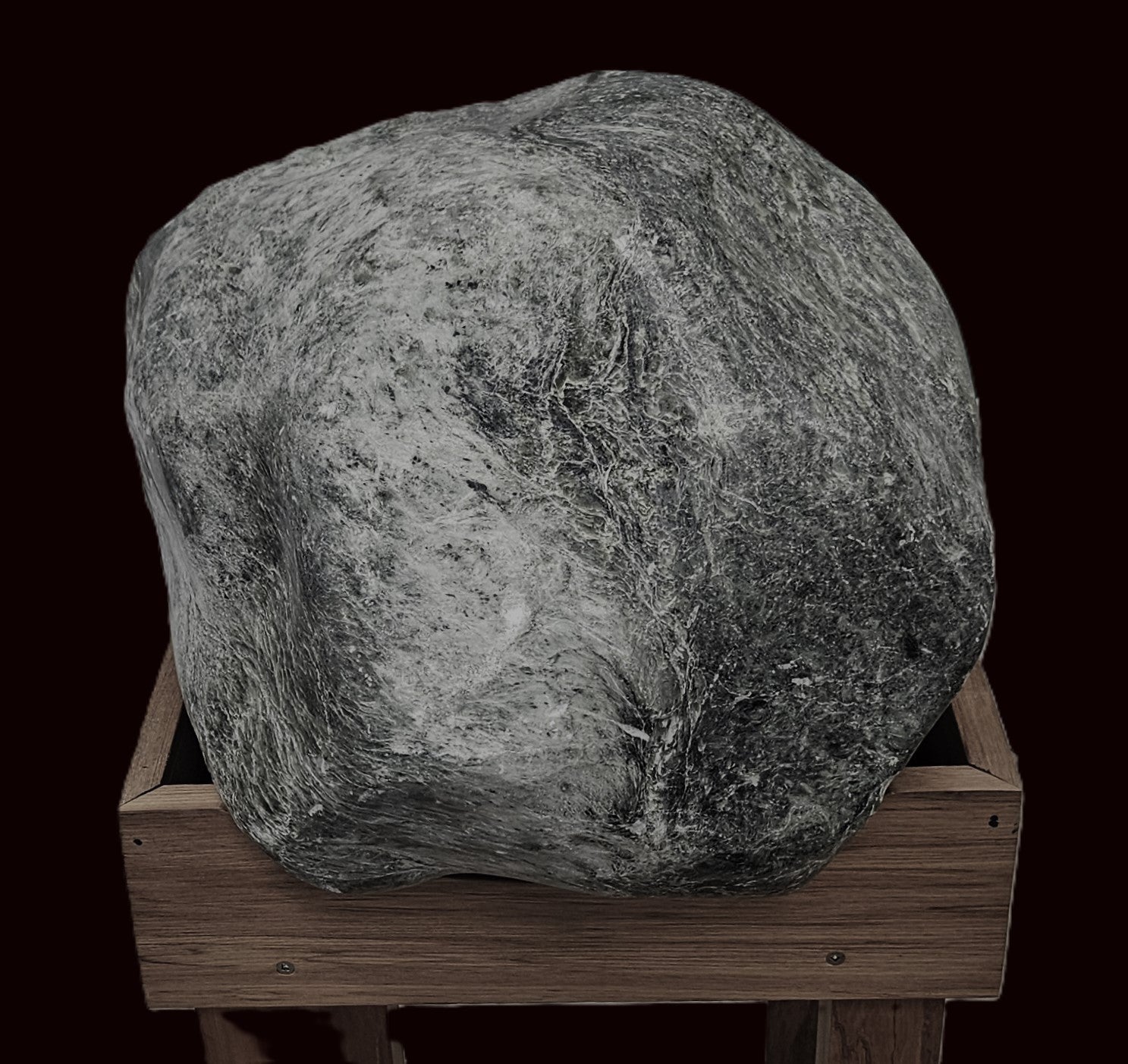 Large mounted Anita Bay jade boulder on native timber stand