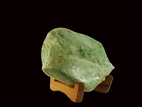 Freeform jade sculpture mounted on a rimu base (IN0014)