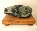 Freeform jade sculpture mounted on a rimu base (KW0007)