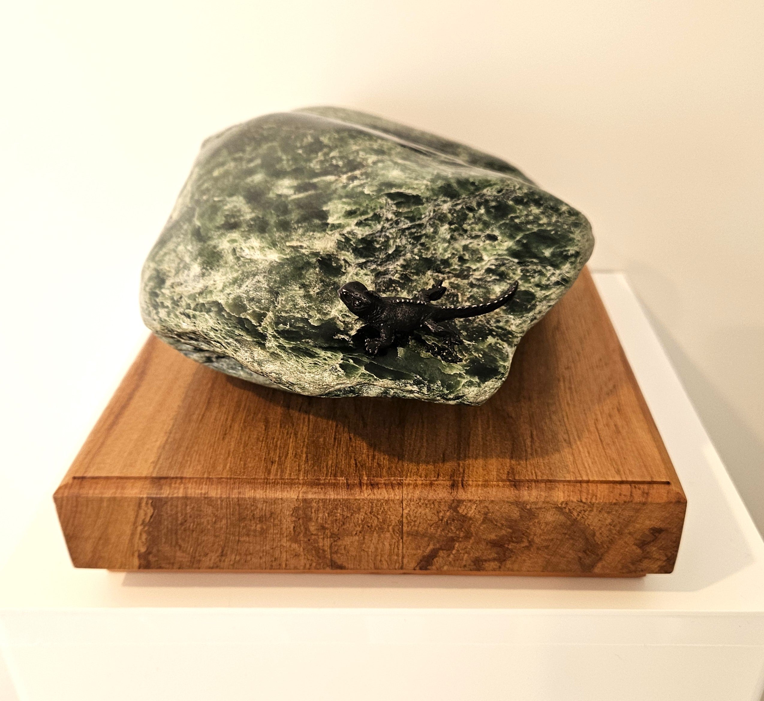 Freeform jade sculpture mounted on a rimu base (KW0007)