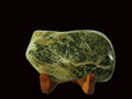 Freeform polished jade mounted on a rimu base (MF0015)