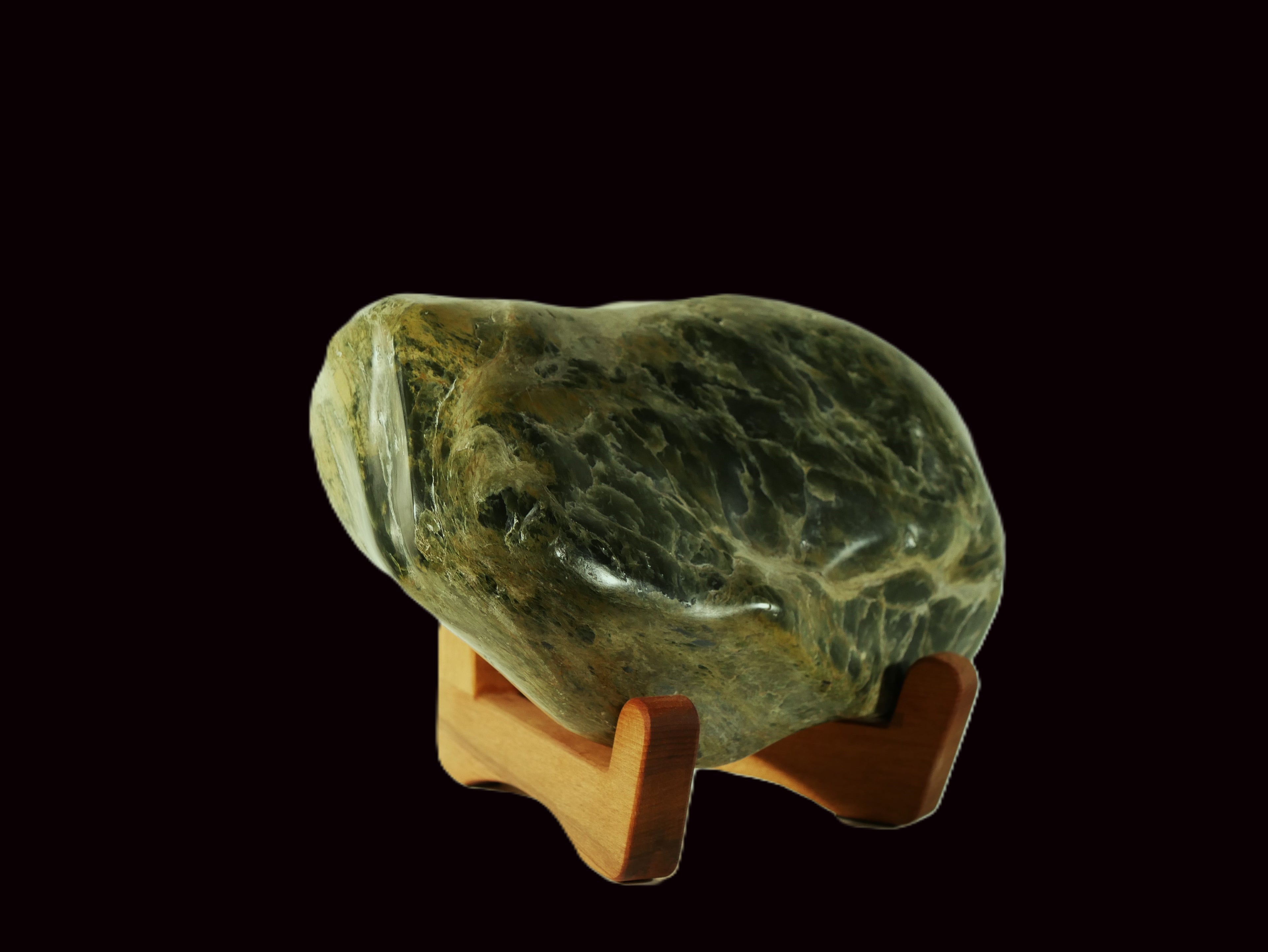 Freeform polished jade mounted on a rimu base (MF0015)