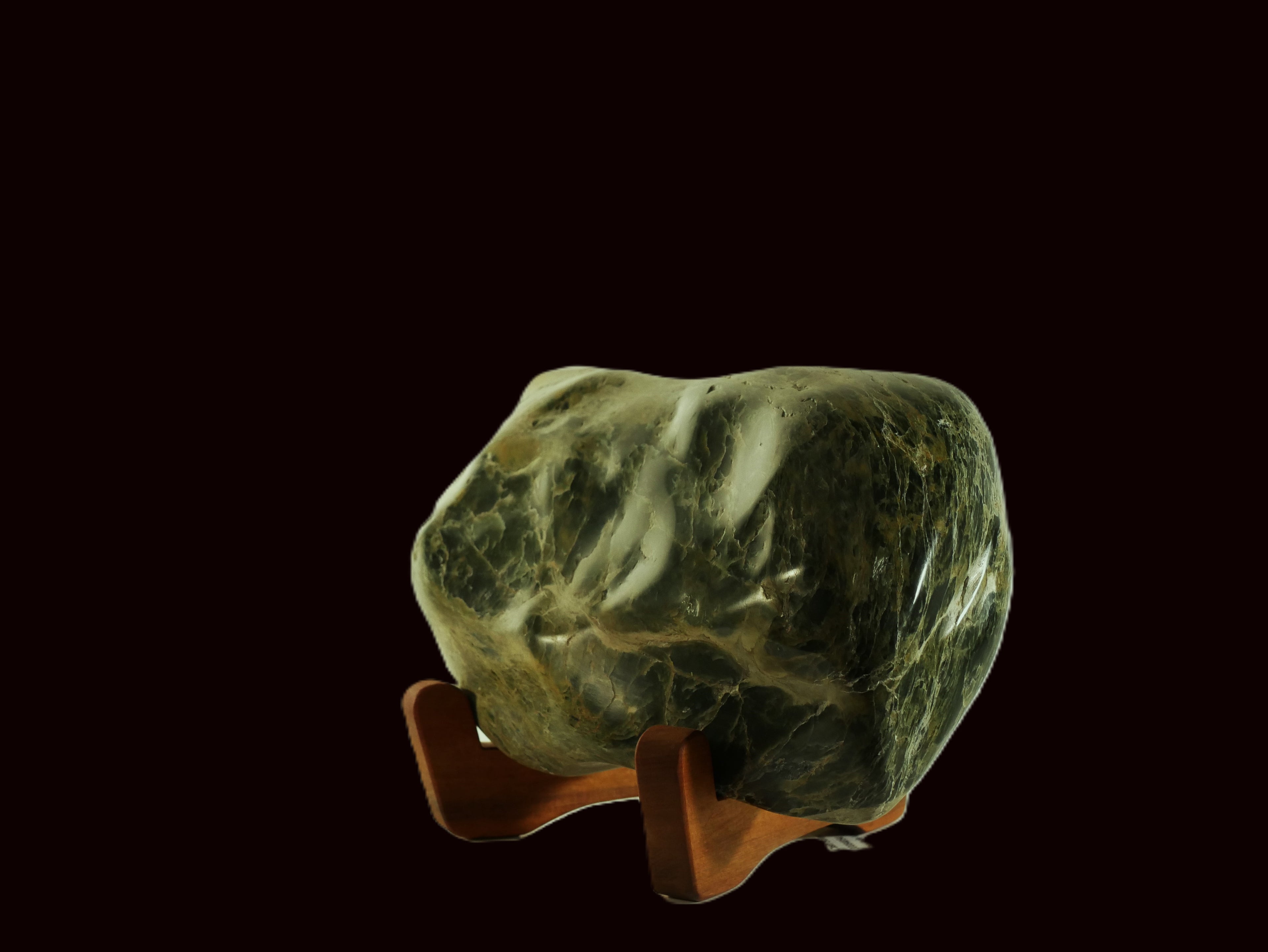 Freeform polished jade mounted on a rimu base (MF0015)