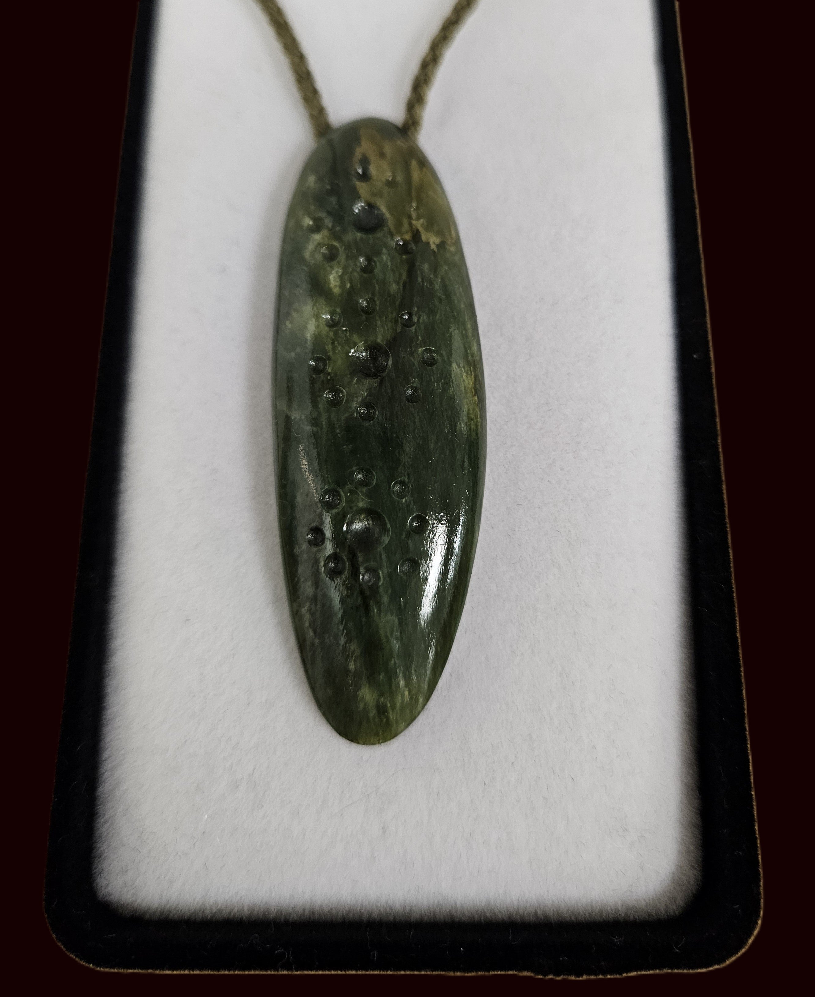 Dimple jade pendant