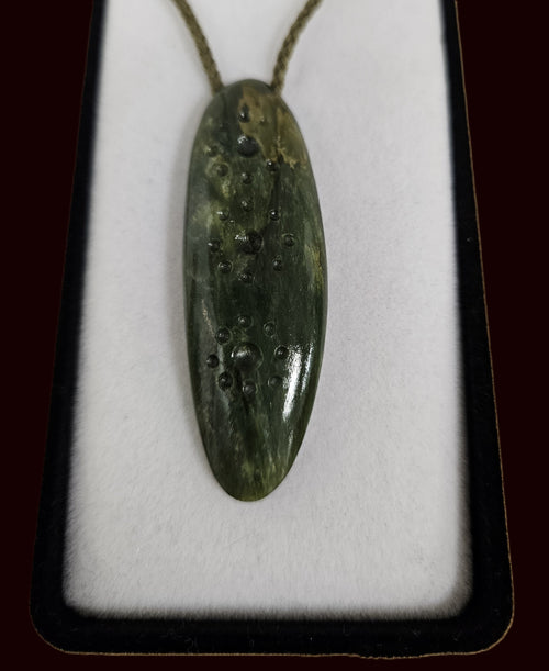 Dimple jade pendant